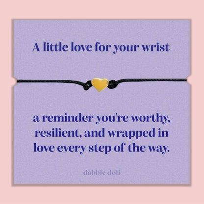 Dabble Doll bracelet chrome heart on a purple card with an inspiring message about worthiness and love