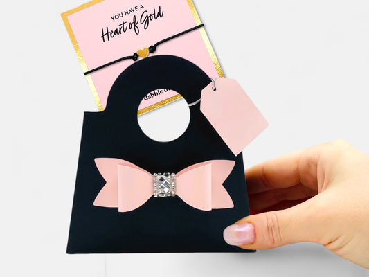 Dabble Doll Pink Bow Bracelet in Gift Bag, a charming accessory for girls and women