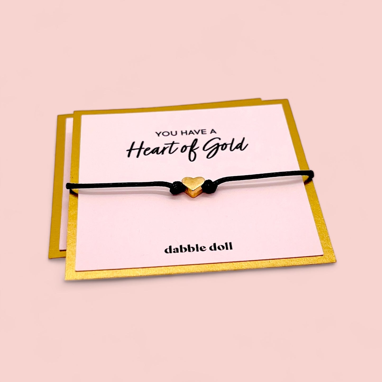 Dabble Doll Heart of Gold Bracelet in Black cord with a gold heart charm for girls and women
