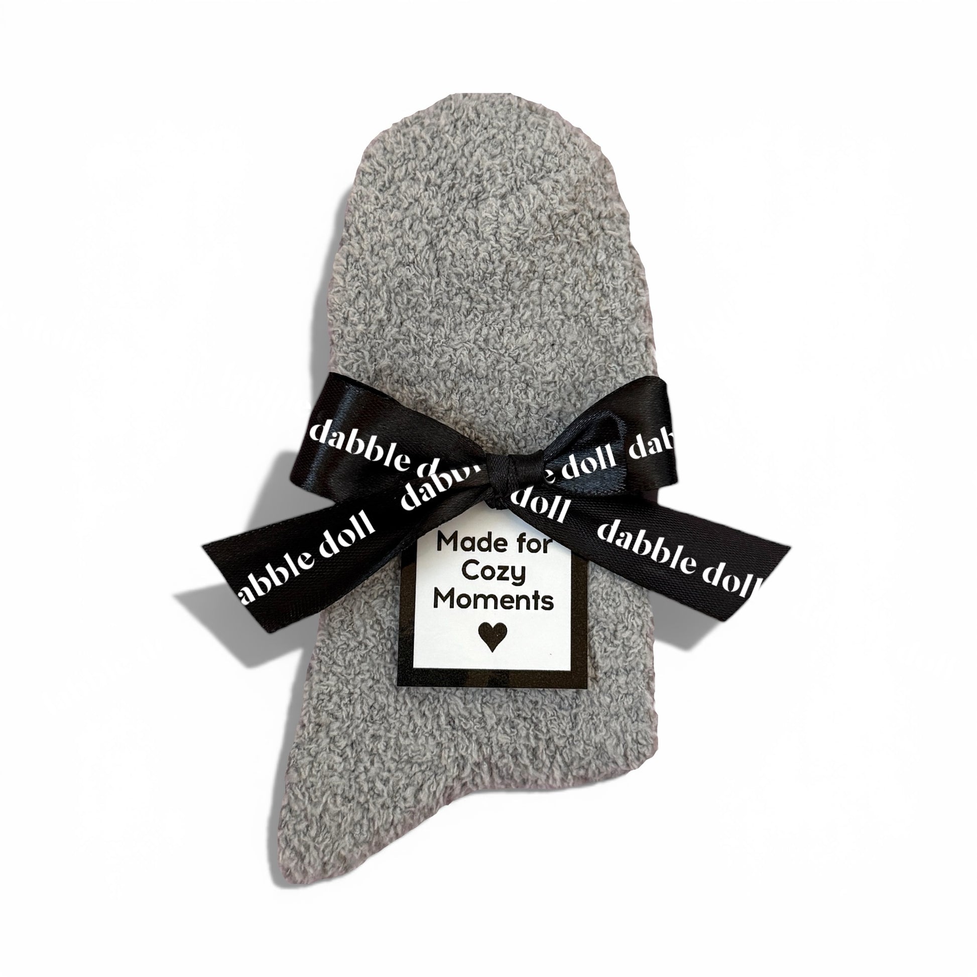 Dabble Doll Gift Box featuring cozy socks for women wrapped with a stylish black bow