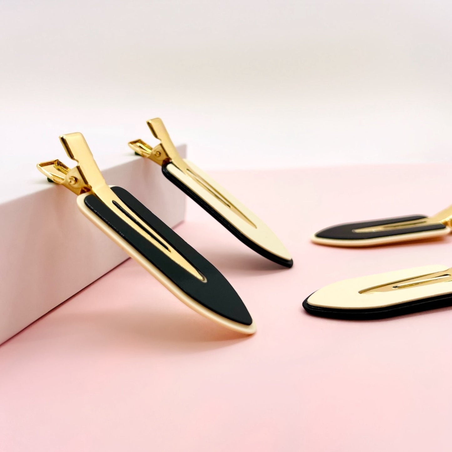 Dabble Doll crease free hair clips in black and gold metal for stylish hair hold without creases