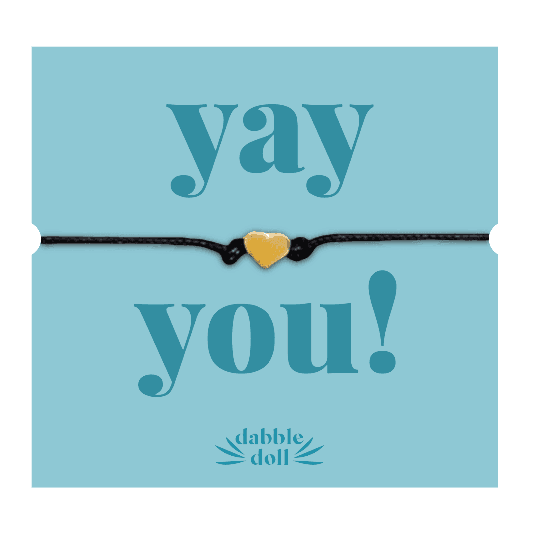 Dabble Doll Friendship Bracelet in Black with Yellow Heart Charm, perfect for girls and women