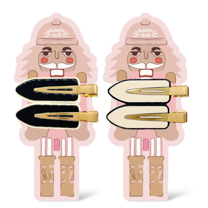 Dabble Doll gift box featuring cute nutcracker hair clips in pink, black, and cream for girls and women