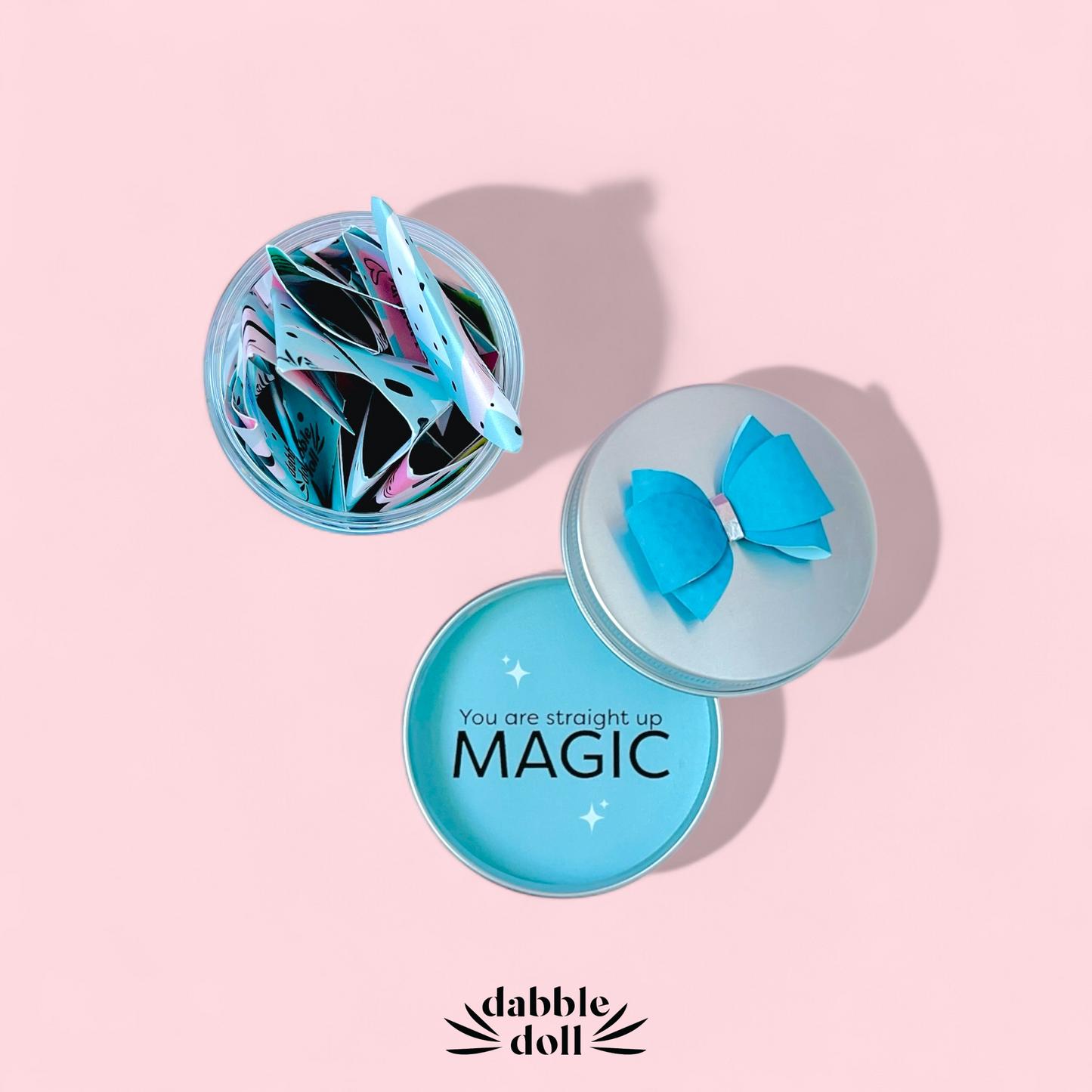 Dabble Doll gift box in pastel colors, perfect for girls and women, featuring fun magical items
