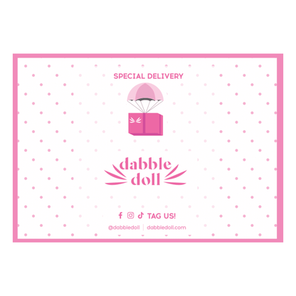 Dabble Doll pink gift box design with a special delivery theme, perfect for girls and women