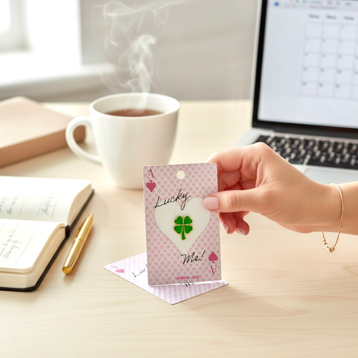 Dabble Doll Lucky Charm Gift Card featuring a four-leaf clover, perfect as a good luck gift