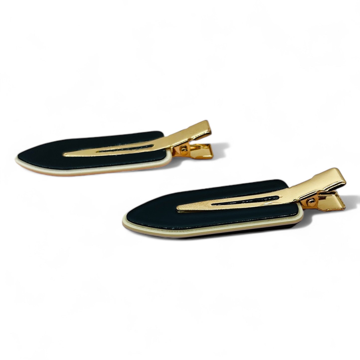 Dabble Doll Black and Gold Hair Clips designed for girls and women with a stylish leaf shape