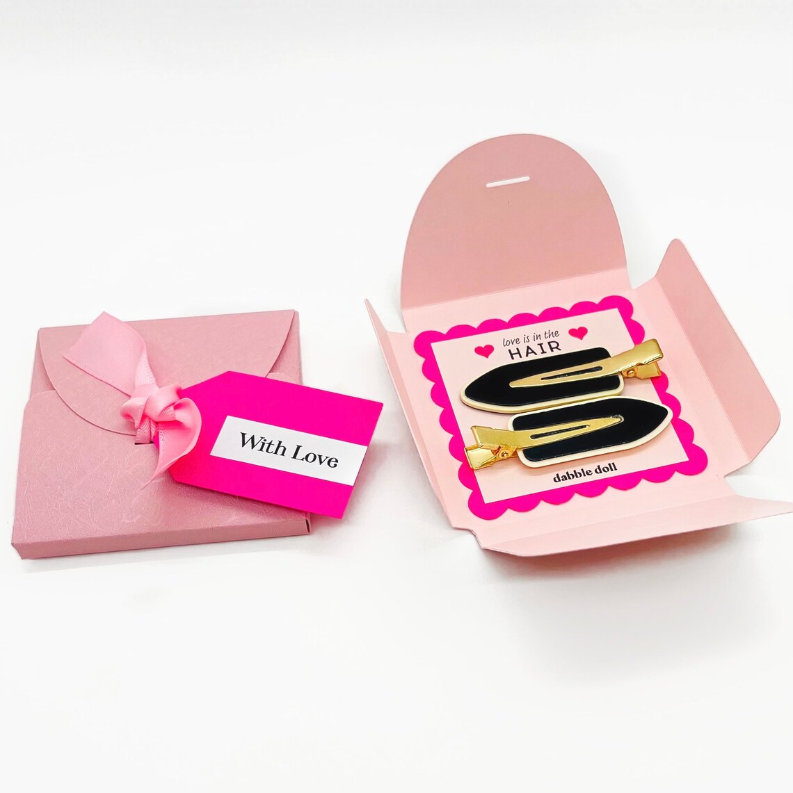 Dabble Doll Hair Clips in gold and black, perfect for girls and women, stylish and elegant gift packaging