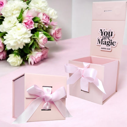 Dabble Doll happy jar gift box in pink with ribbon, featuring 'You are Magic' inscription.