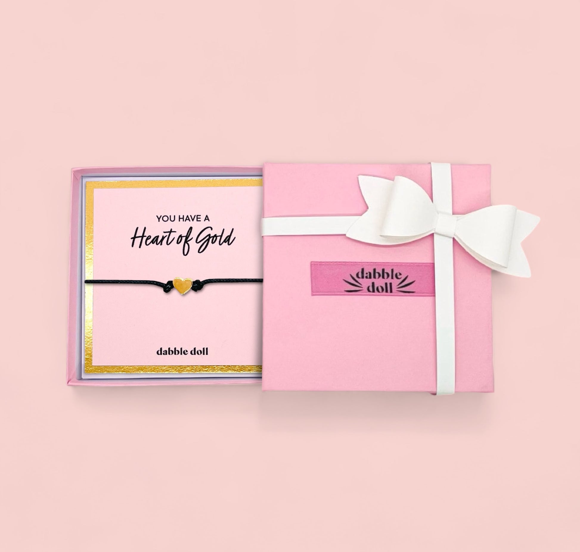 Gift box by Dabble Doll featuring a heart bracelet in black for girls and women, perfect for special occasions