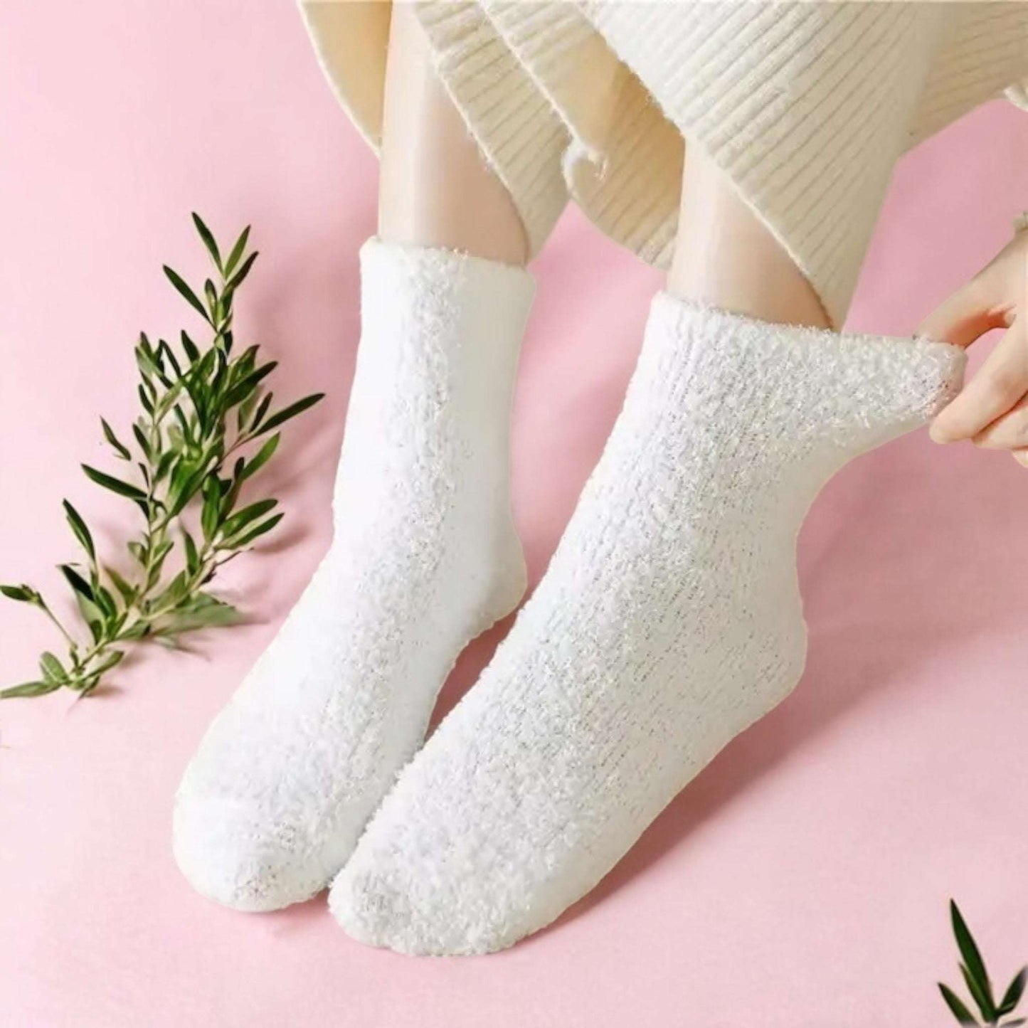 Cozy white fuzzy socks from Dabble Doll perfect for a holiday gift set