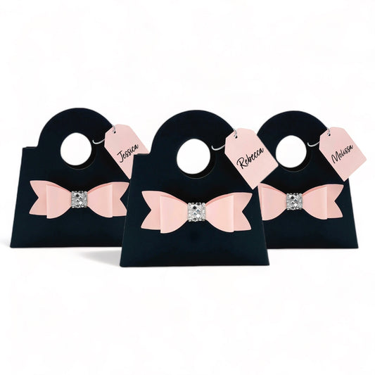 Dabble Doll black mini purse gift bags for bridal shower with pink bows and personalized name tags