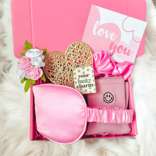 Dabble Doll mini Valentines gift box with pink sleep mask, socks, heart decor, and love you card