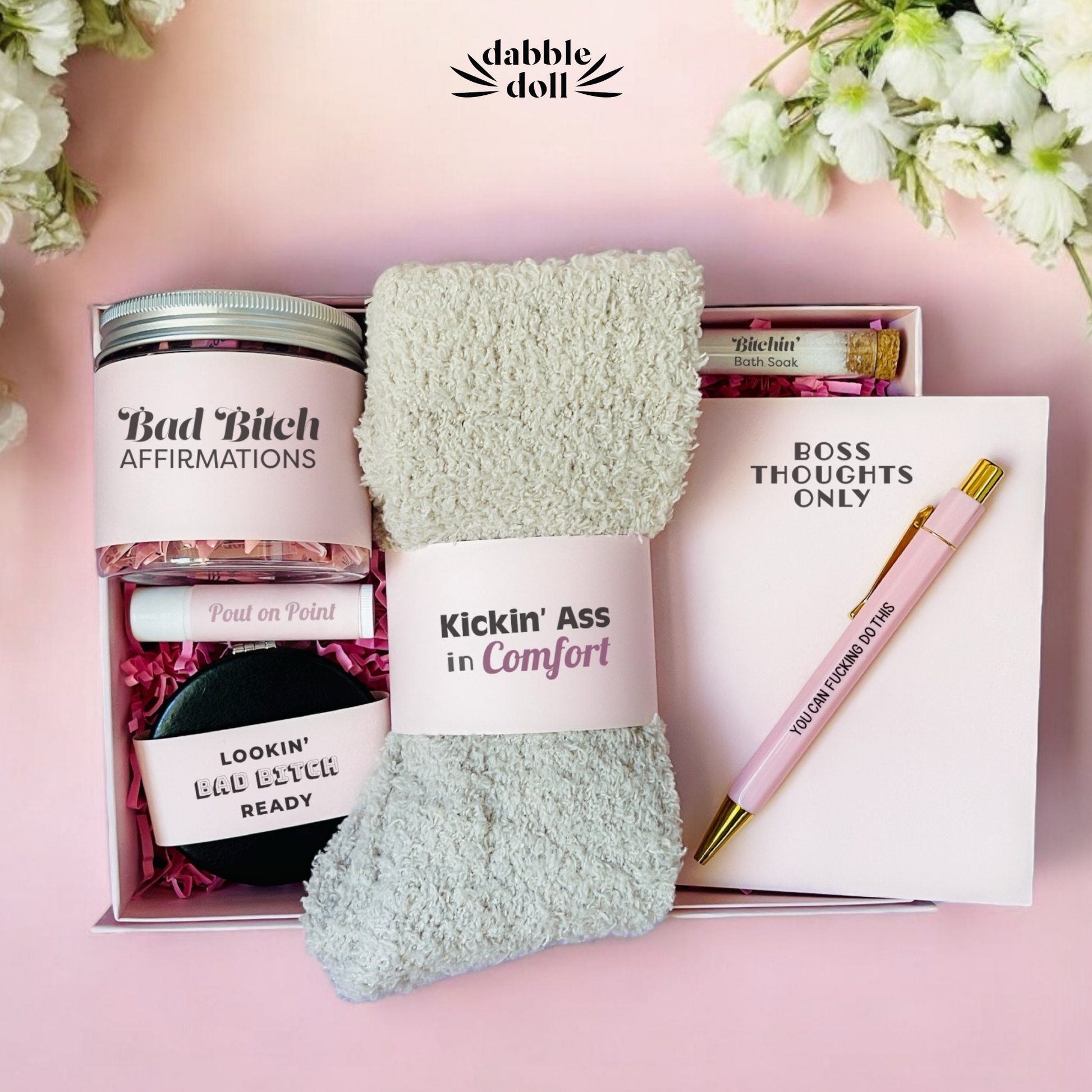 Dabble Doll motivational gift set for her with cozy socks, affirmations jar, lip balm, pen, and notebook