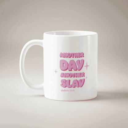 Dabble Doll gift box featuring a mug with the phrase Another Day Another Slay in playful pink text