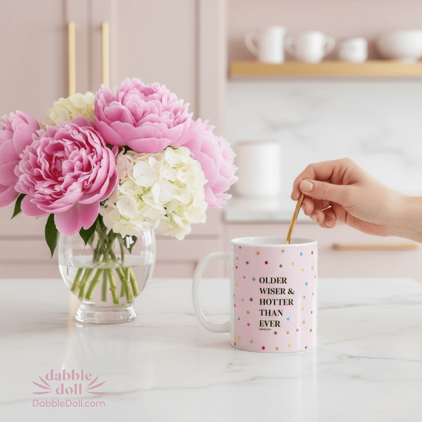 Stylish gift box featuring a fun mug that reads Older Wiser & Hotter Than Ever with pink flowers in the background