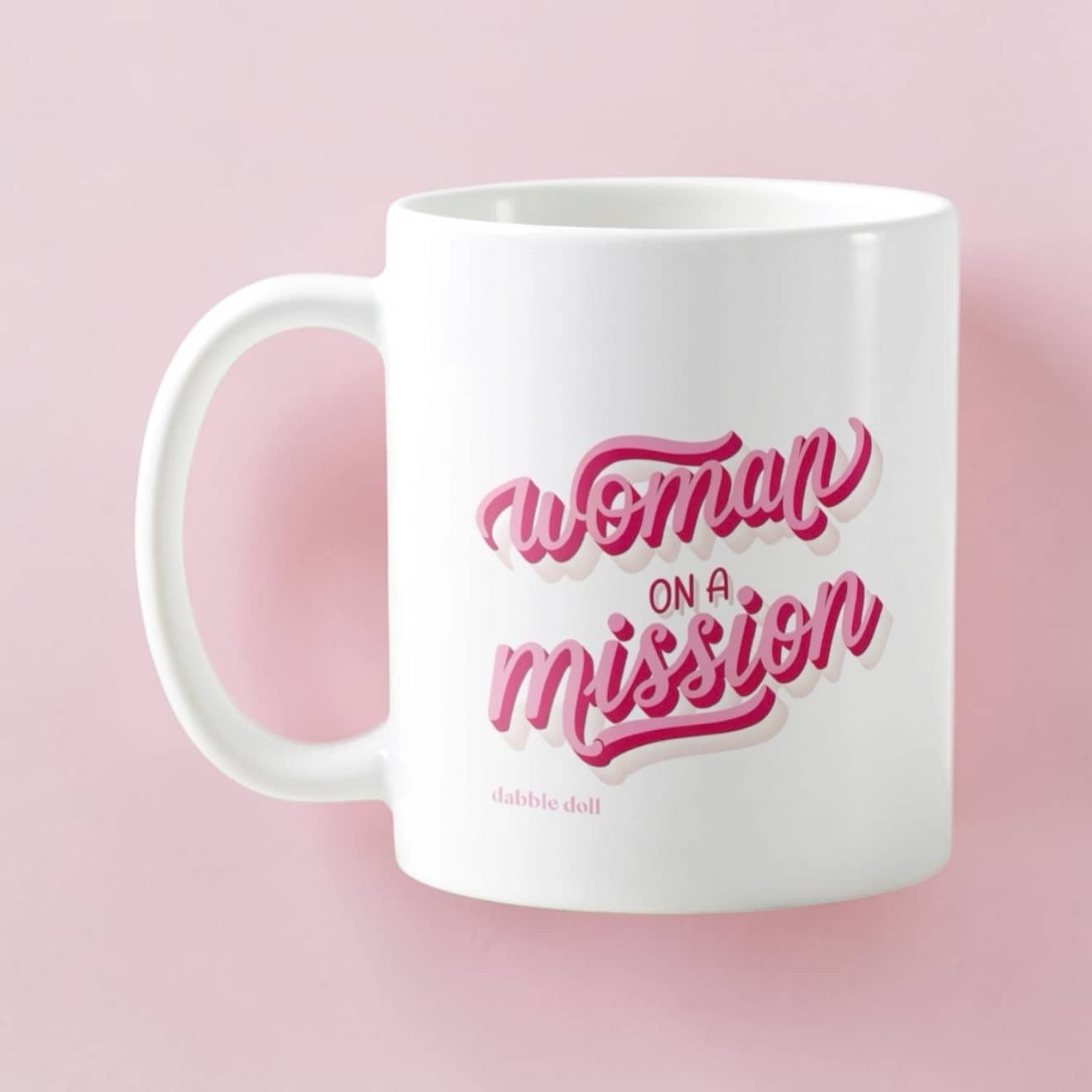 Dabble Doll novelty mug featuring the phrase Woman on a Mission in stylish pink lettering
