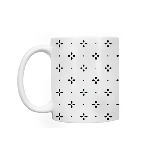 Dabble Doll Gift Box containing a stylish patterned coffee mug with a floral design