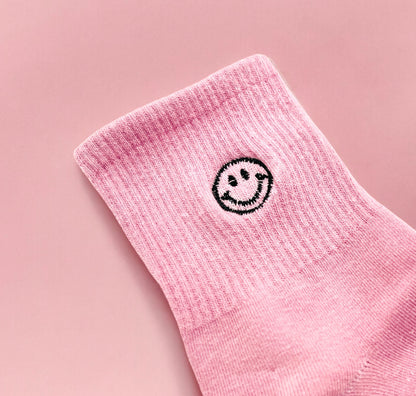 Dabble Doll Pink Socks with a Smiley Face Design for Casual and Comfortable Wear
