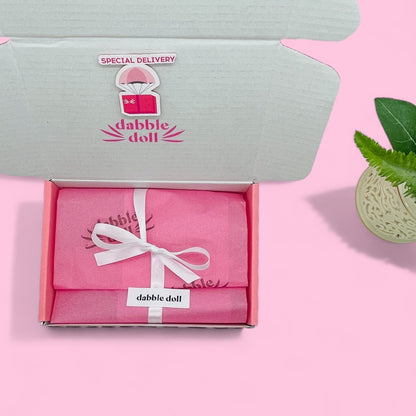 Dabble Doll pink gift box with tissue for ladies featuring an affirmation inside, perfect for girls and women
