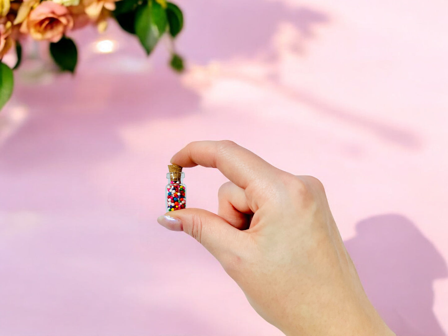Small glass jar of colorful sprinkles with cork lid, perfect for girls and women crafting projects