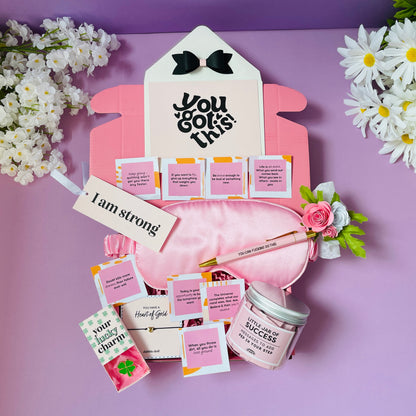 Dabble Doll success gift box for women with pink sleep mask, motivational cards, pen, and scented jar