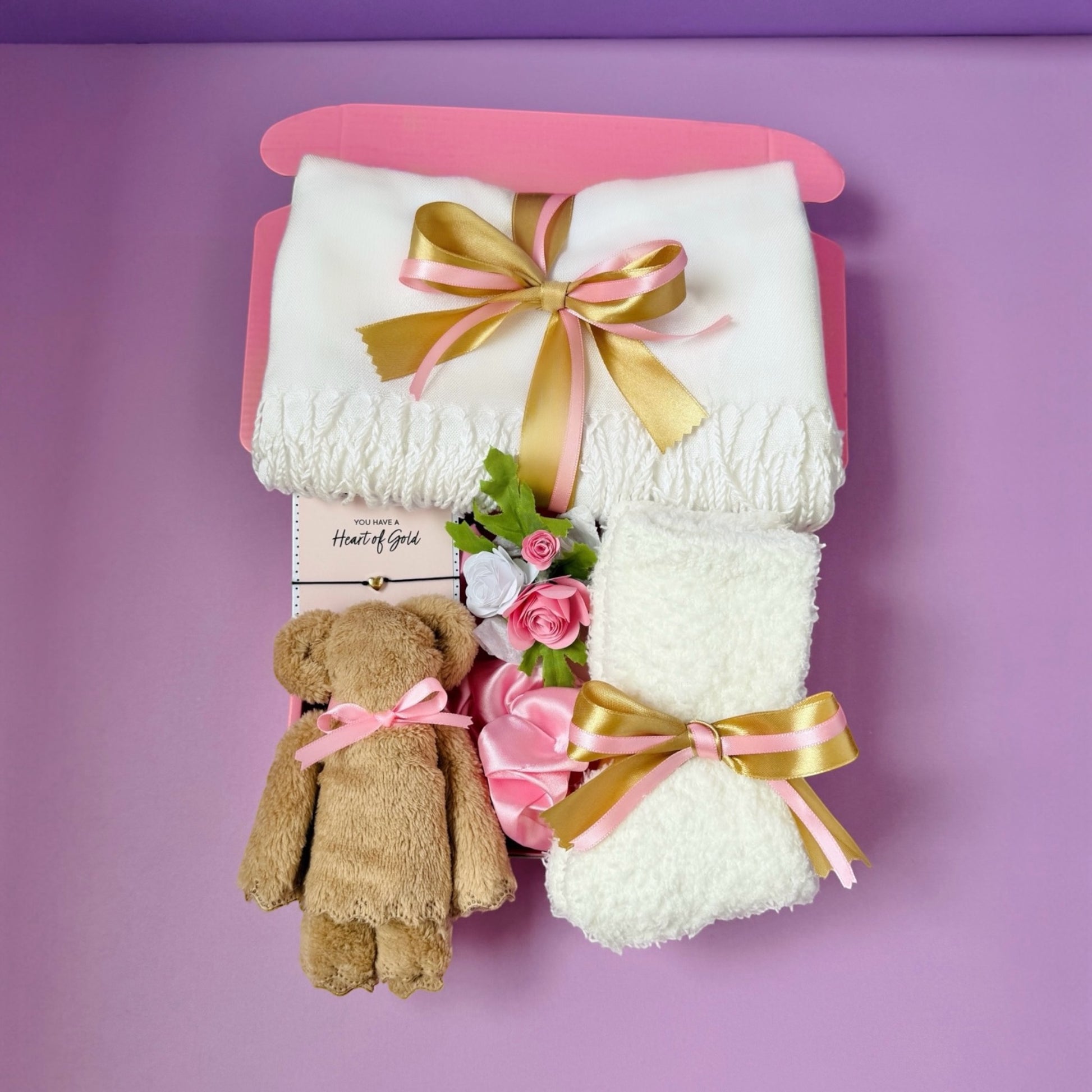Dabble Doll thinking of you gift box for her with plush teddy bear, soft white blankets, and pink roses