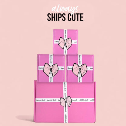 Dabble Doll thinking of you gift box for her in pink with white ribbon and bow packaging