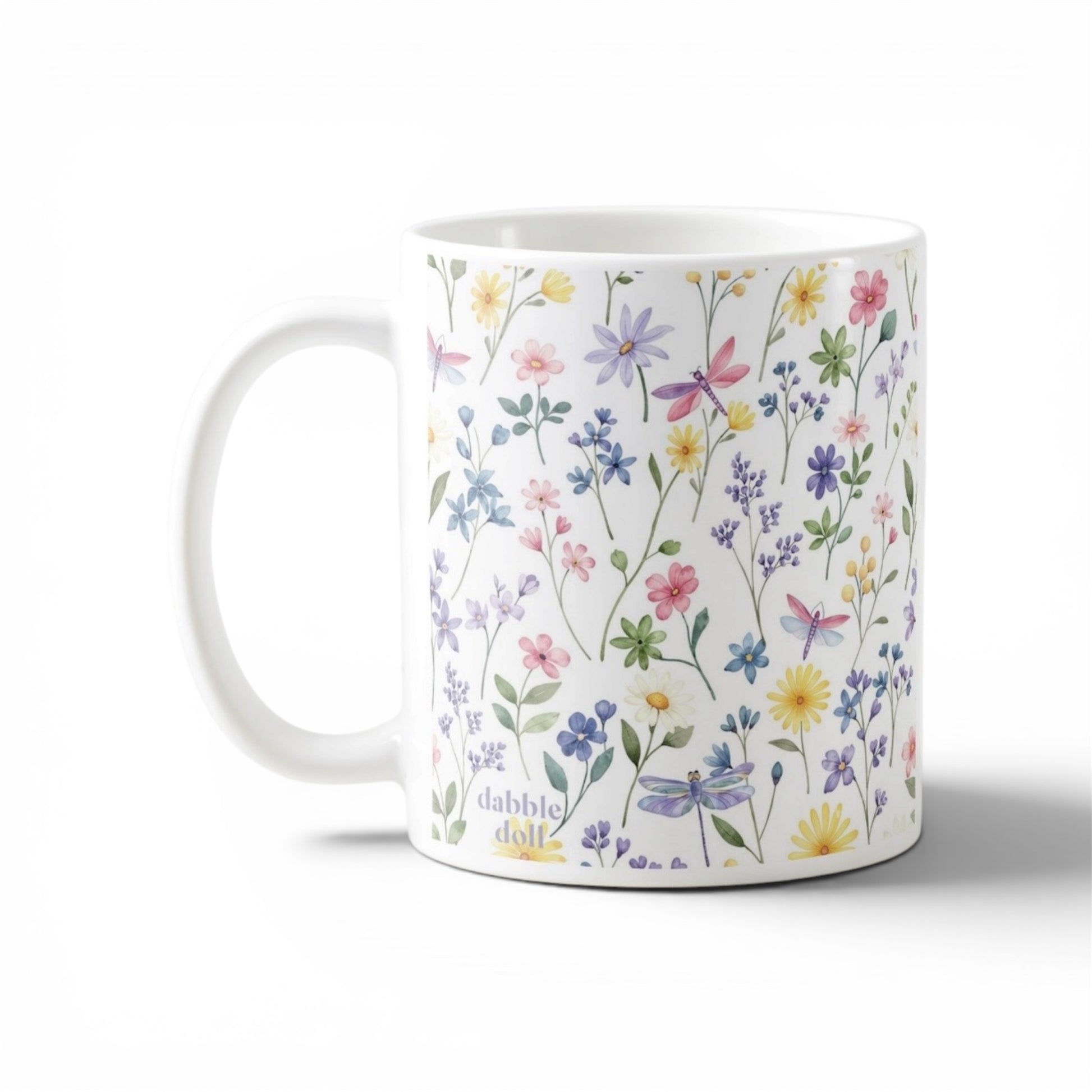 Dabble Doll gift box featuring a wildflower mug decorated with colorful floral patterns