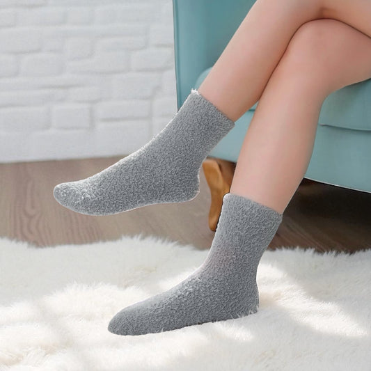 Cozy gray socks in a women's gift idea gift box for ultimate relaxation at home