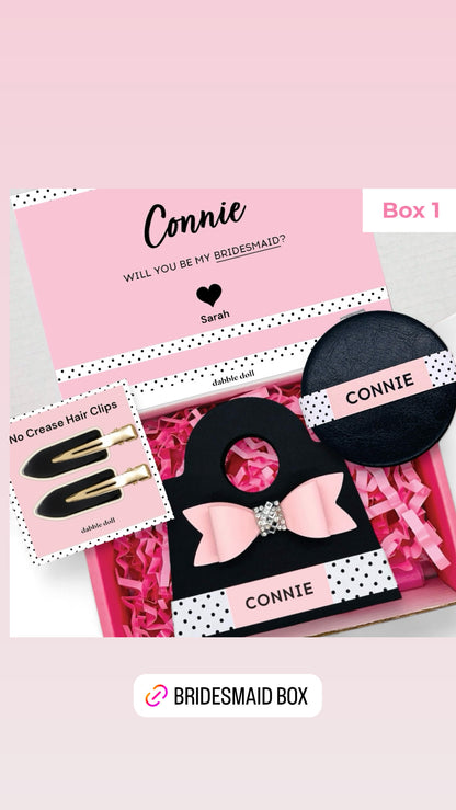 Dabble Doll Gift Box in pink and black for girls featuring no crease hair clips and a personalized note