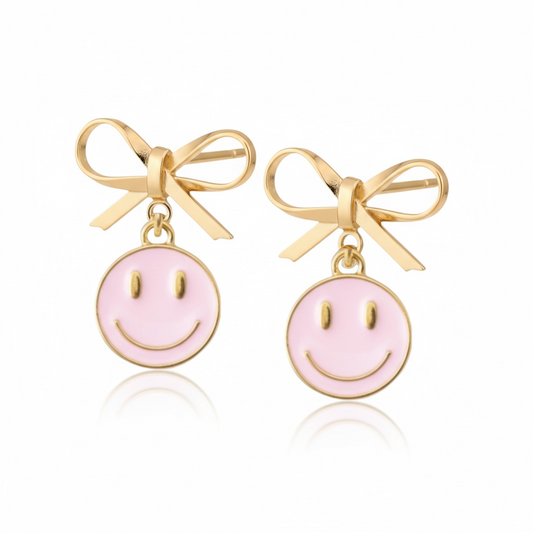Dabble Doll Smiley Face Earrings with Pink Enamel and Bow Detail for a Playful Look