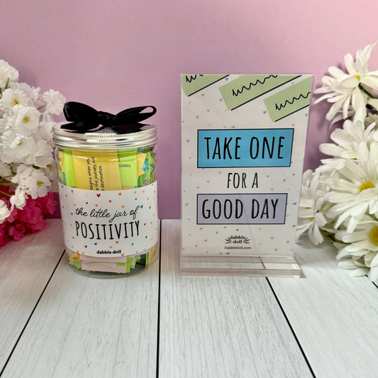 Dabble Doll display jar filled with colorful positivity notes, perfect for girls and women