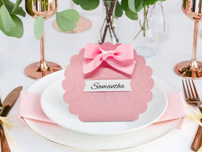 Pink scalloped favor box with bow, perfect for girls and women’s parties and celebrations