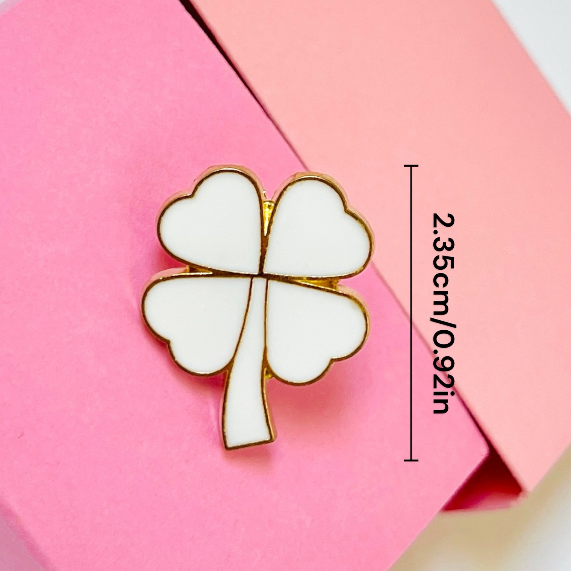 White Four leaf clover enamel pin for girls and women with gold detailing, perfect for stylish accessorizing