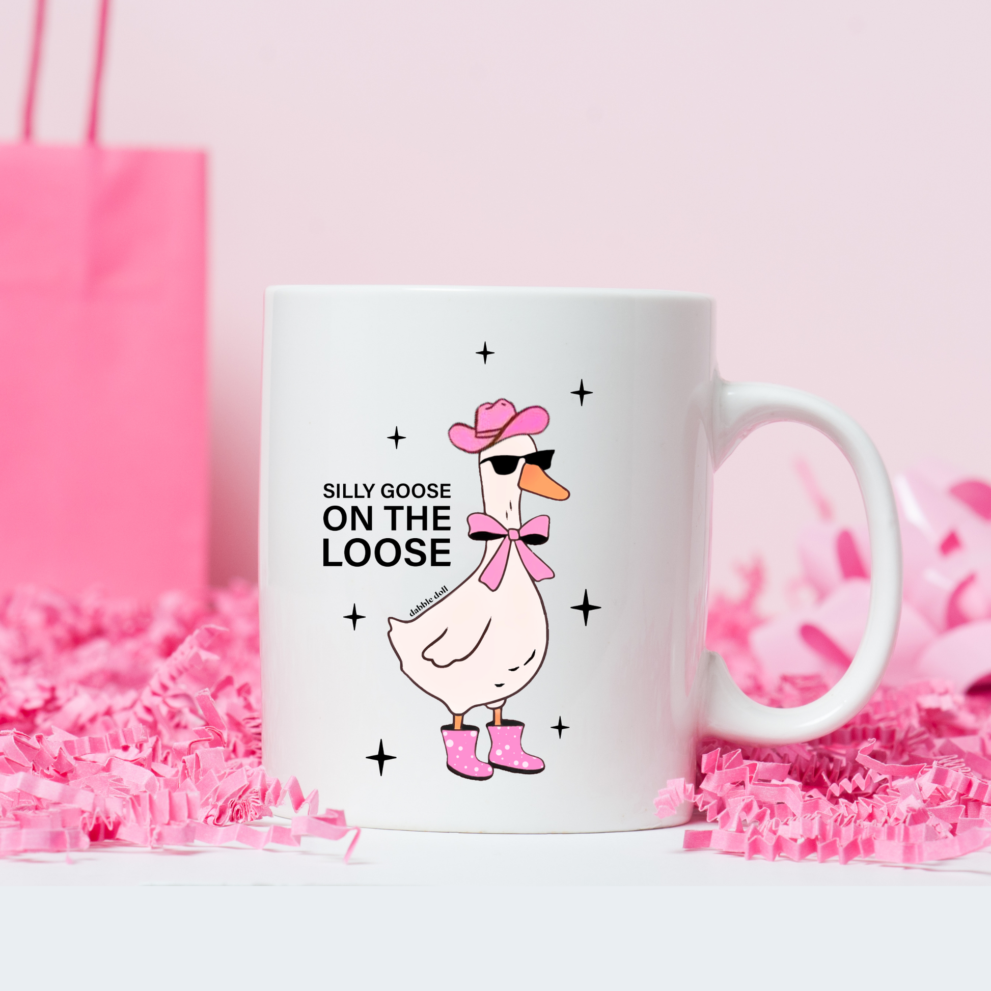 Funny coffee mug featuring a silly goose in sunglasses and a bow, perfect for humorous gift giving