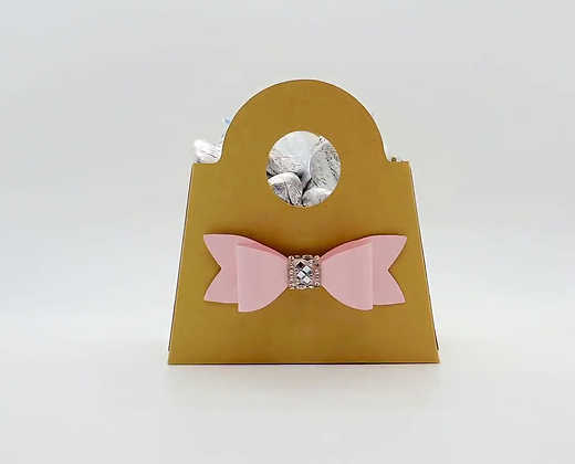 Gold Dabble Doll Gift Bag with Pink Bow Detail, perfect for girls and women
