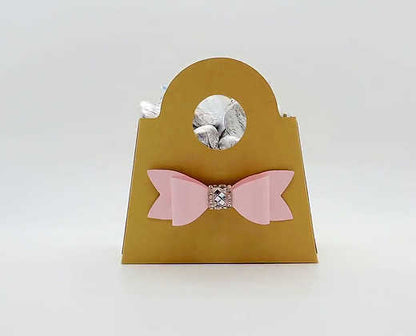 Gold Dabble Doll Gift Bag with Pink Bow Detail, perfect for girls and women