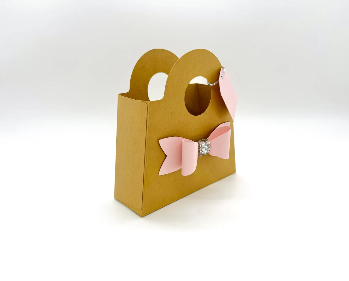 Dabble Doll Gift Bag in brown with pink bow, perfect for girls and women for special occasions
