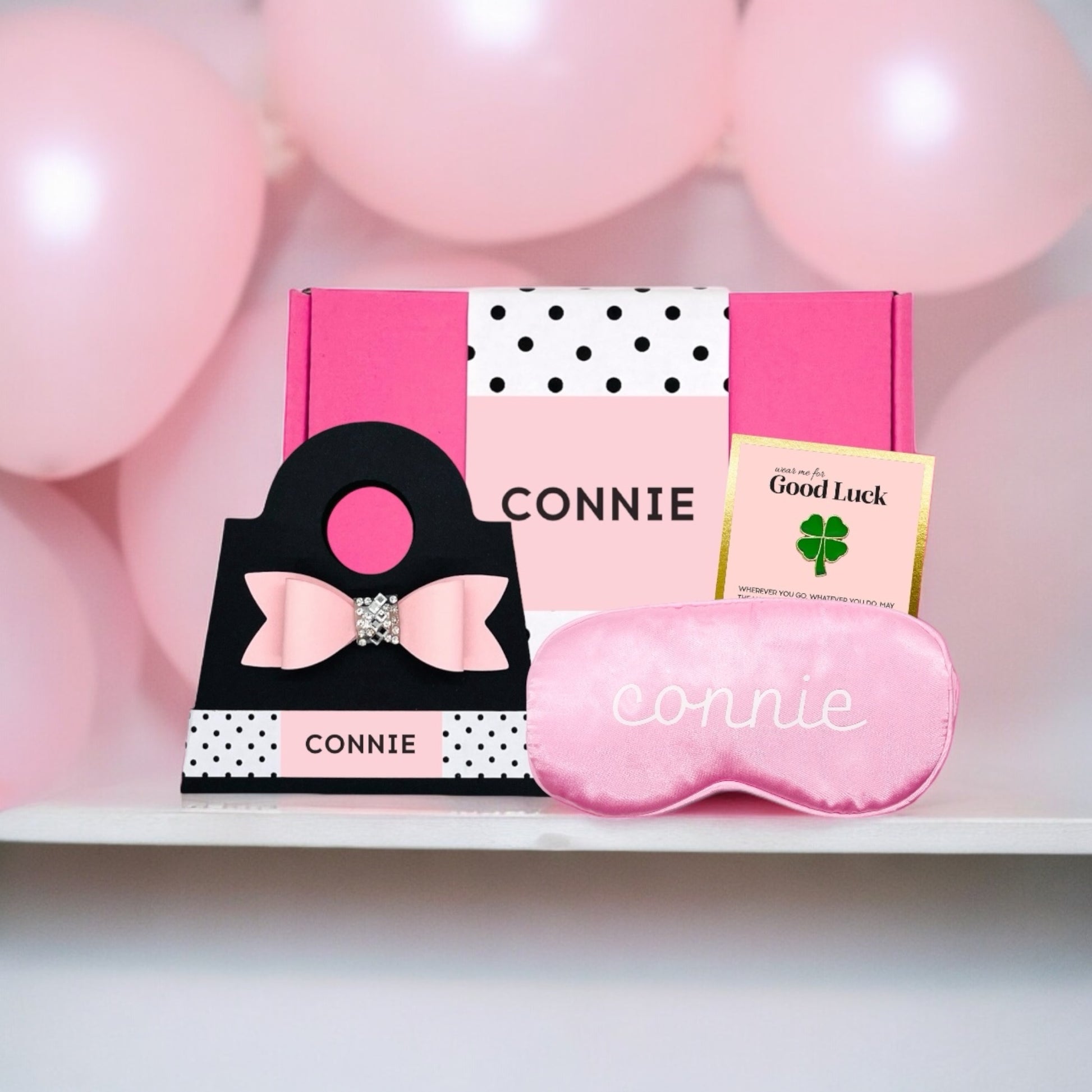 Pink Dabble Doll gift box for girls featuring a sleep mask and a charm for relaxation
