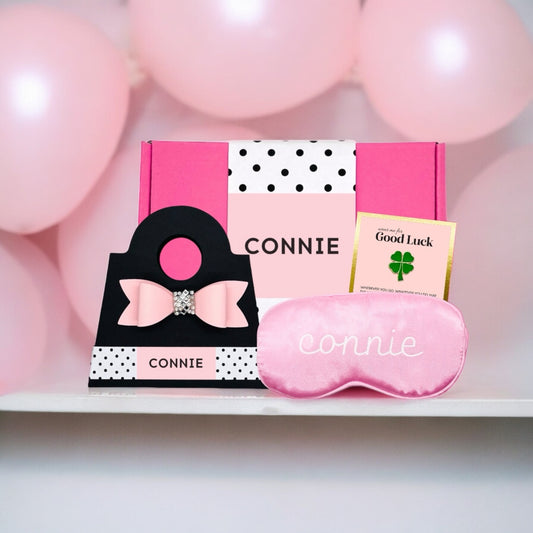Pink Dabble Doll gift box for girls featuring a sleep mask and a charm for relaxation