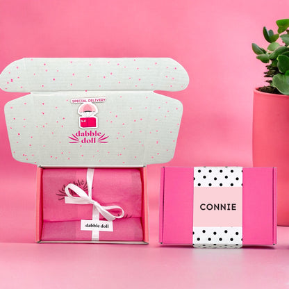 Pink Dabble Doll gift box featuring feminine design perfect for girls and women