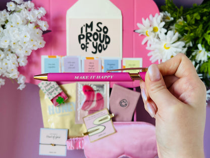 Dabble Doll pink gift box for girls featuring a stylish pen and cheerful notes
