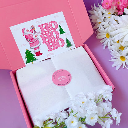 Pink Gift Box for girls featuring festive designs and wrapped in elegant tissue paper