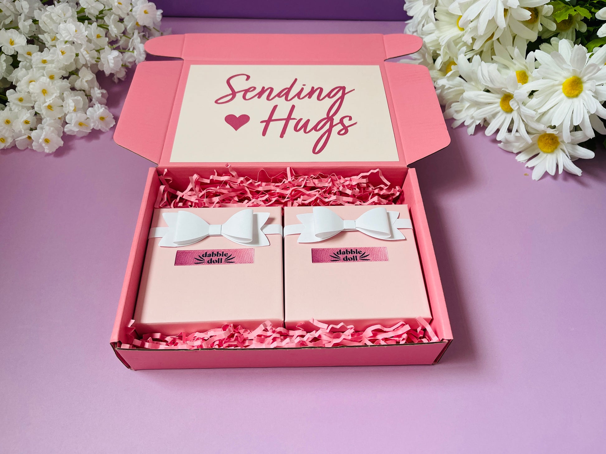 Pink gift box for girls and women featuring a Sending Hugs design with two charming gift items