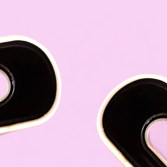 Black and white Dabble Doll hair clips designed for girls and women with a stylish modern look