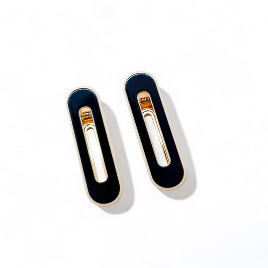 Dabble Doll navy hair clips for girls and women with a sleek gold trim design