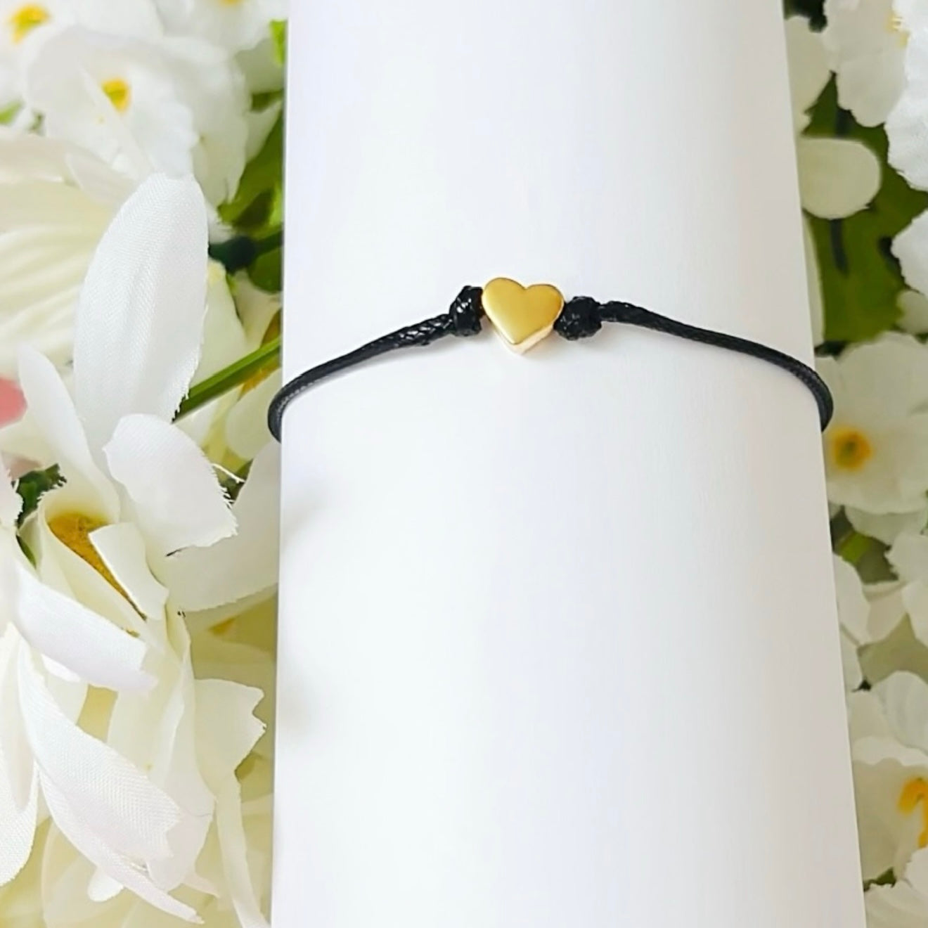 Dabble Doll heart bracelet in black with gold heart charm, perfect for girls and women