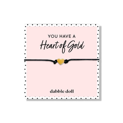 Dabble Doll heart bracelet in gold with black cord, perfect gift for girls and women