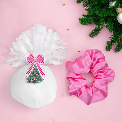 White and pink satin scrunchie hair accessory for girls, women, and ladies with festive design